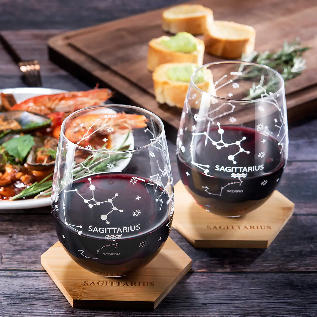 Set of 2 Zodiac Sign Wine Glasses with 2 Wooden Coasters by The Wine Savant - Astrology Drinking Glass Set with Etched Constellation Tumblers for Juice, Home Bar Horoscope Gifts 18oz (Sagittarius)
